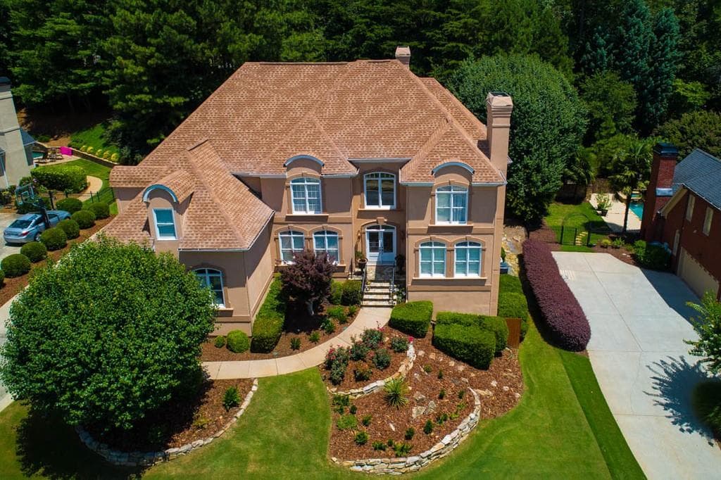 6 bedroom, 6 bathroom, 6,700 sq ft single family residence sold at 4040 FALLS RIDGE Drive, Johns Creek, GA 30022