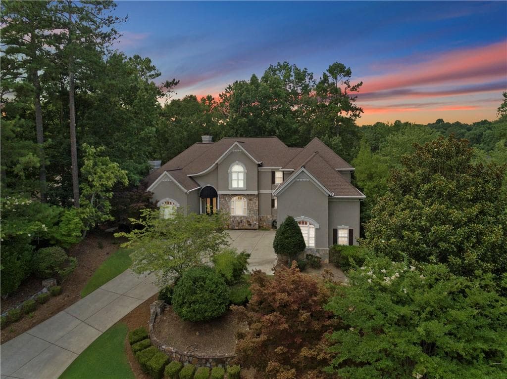 7 bedroom, 5 bathroom, 8,112 sq ft single family residence sold at 205 Wicklawn Way, Roswell, GA 30076