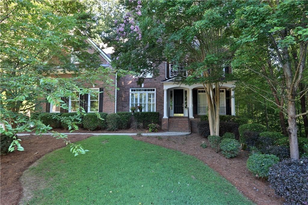 5 bedroom, 4 bathroom, 3,496 sq ft single family residence sold at 939 Ravenwood Way, Canton, GA 30115