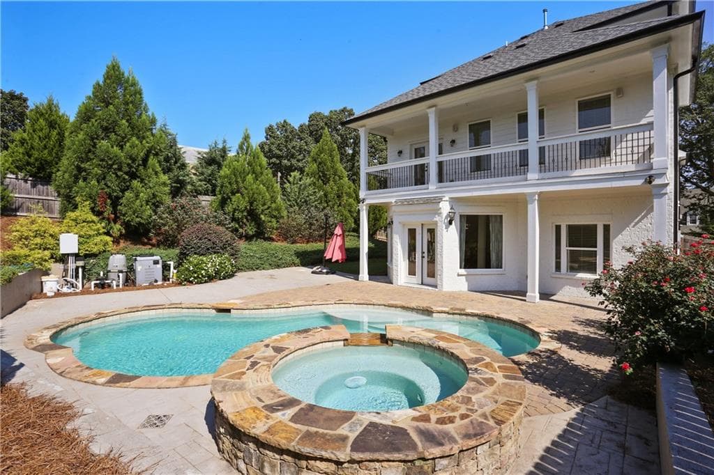5 bedroom, 6 bathroom, 4,600 sq ft single family residence sold at 1881 Raven Hill Drive, Brookhaven, GA 30319