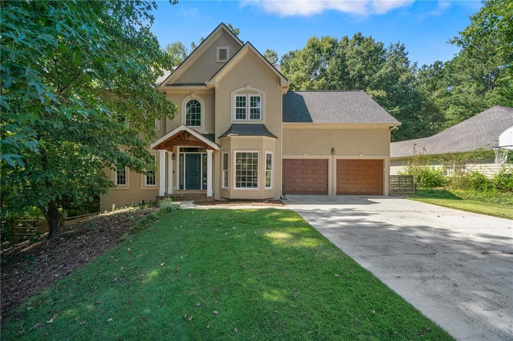 4 bedroom, 3 bathroom, 3,852 sq ft single family residence sold at 1722 Indian Ridge Drive, Woodstock, GA 30189