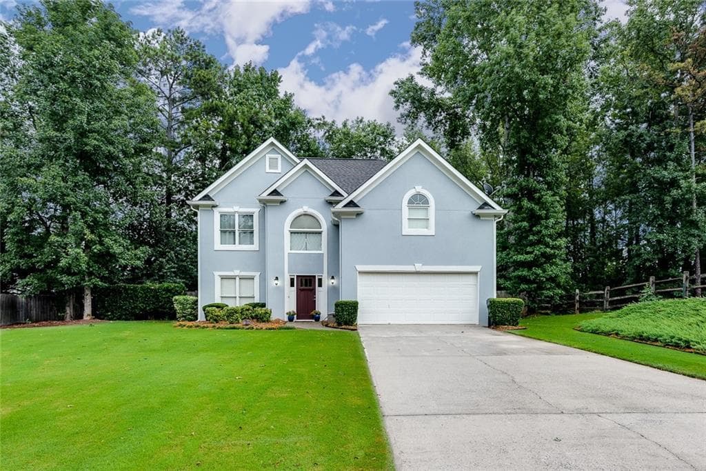 4 bedroom, 3 bathroom, 2,280 sq ft single family residence sold at 4495 Dartmoor Lane, Suwanee, GA 30024