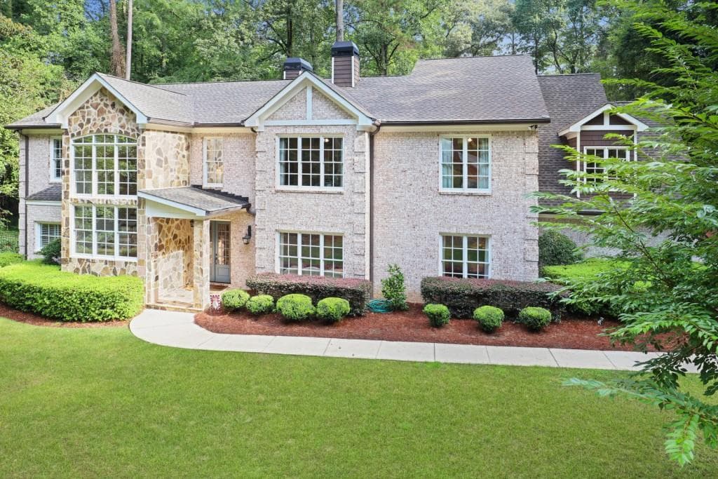 7 bedroom, 7 bathroom, 6,408 sq ft single family residence sold at 1023 Somerset Drive, Atlanta, GA 30327