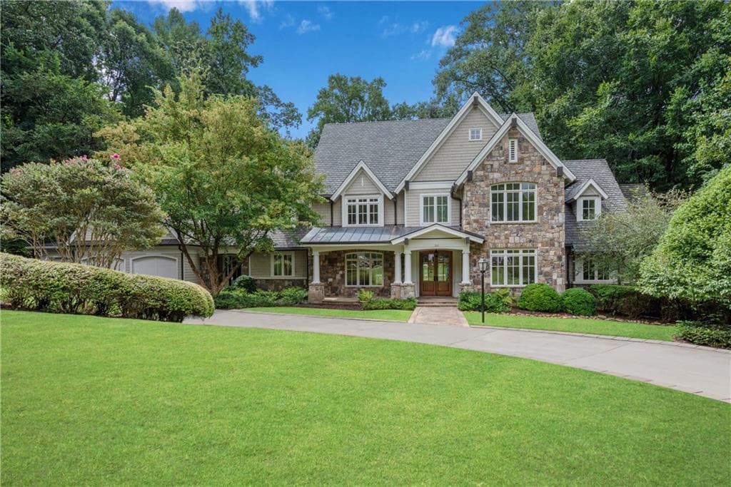 7 bedroom, 10 bathroom, 7,990 sq ft single family residence sold at 310 Tara Trail, Atlanta, GA 30327