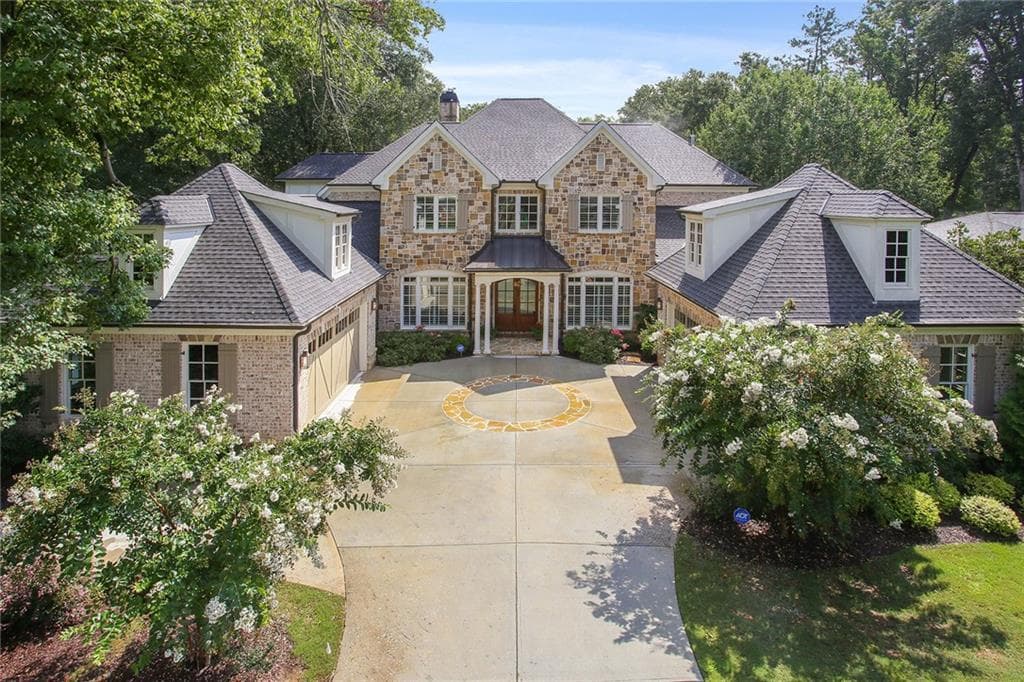 6 bedroom, 8 bathroom, 8,200 sq ft single family residence sold at 4685 Lake Forrest Drive, Atlanta, GA 30342