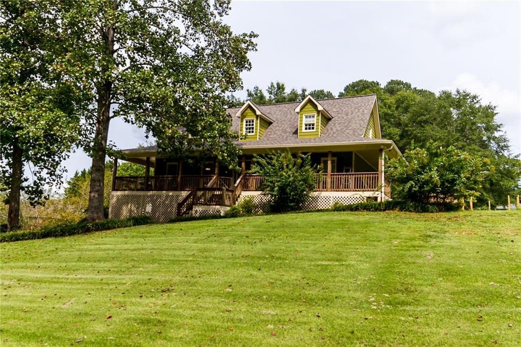 4 bedroom, 3 bathroom, 2,964 sq ft single family residence sold at 1215 Tom Hulsey Drive, Canton, GA 30115