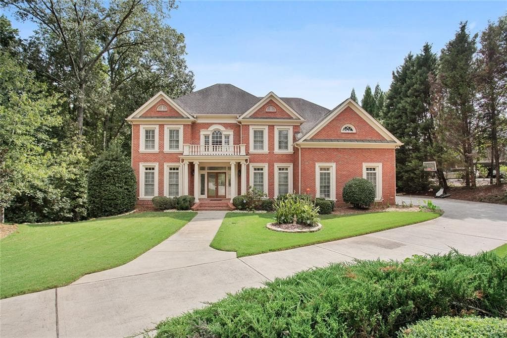 6 bedroom, 6 bathroom, 7,164 sq ft single family residence sold at 565 Glen National Drive, Milton, GA 30004