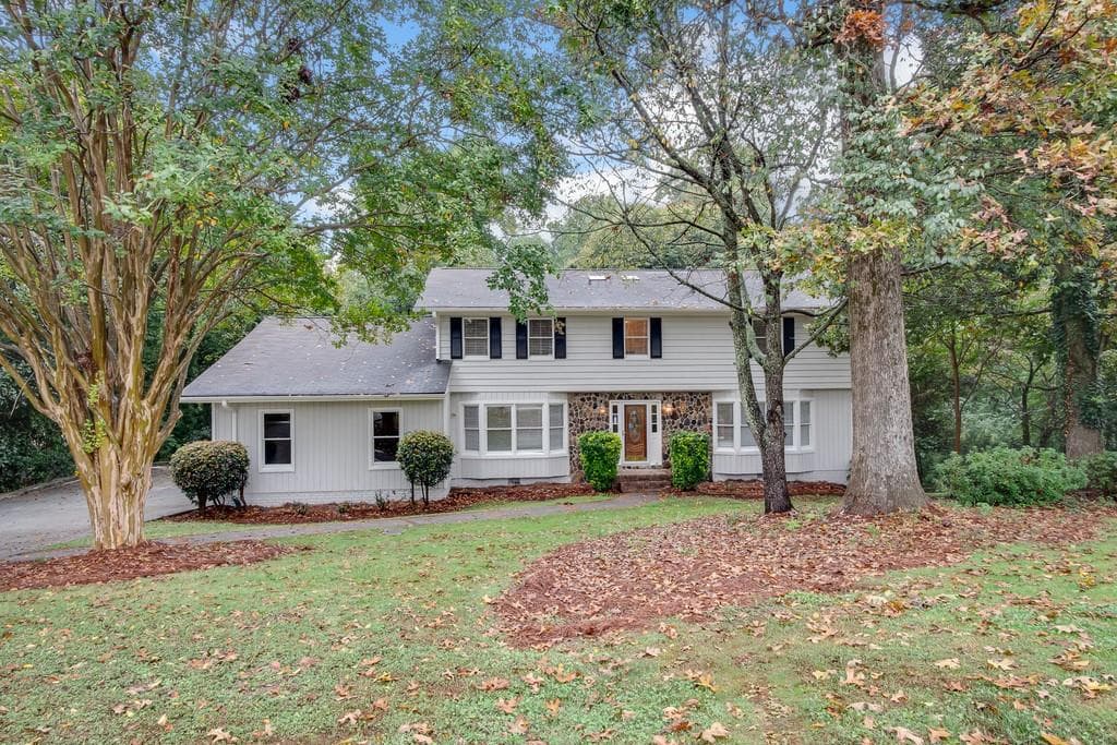 4 bedroom, 4 bathroom, 2,865 sq ft single family residence sold at 4965 N Peachtree Road, Atlanta, GA 30338