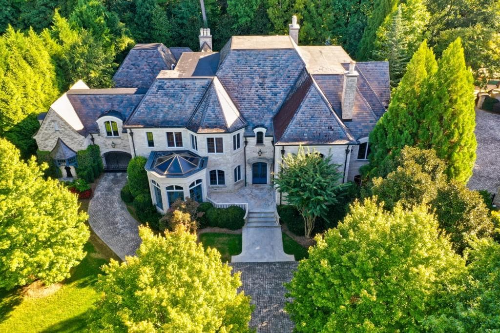 6 bedroom, 9 bathroom, 14,600 sq ft single family residence sold at 203 Saint Nicholas Circle, Atlanta, GA 30327