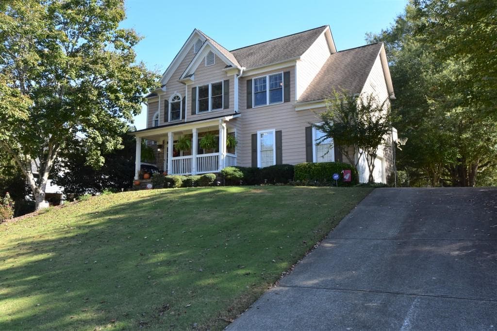 4 bedroom, 3 bathroom, 3,770 sq ft single family residence sold at 2026 Woodside Park Drive, Woodstock, GA 30188