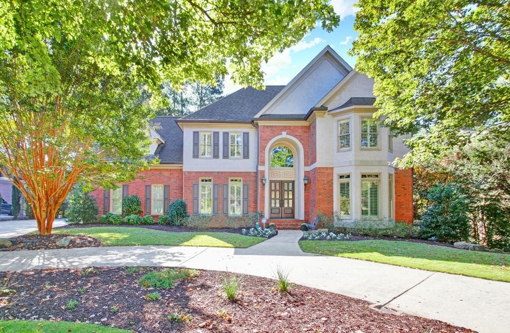 5 bedroom, 5 bathroom, 5,712 sq ft single family residence sold at 2458 Regency Lake Drive, Marietta, GA 30062
