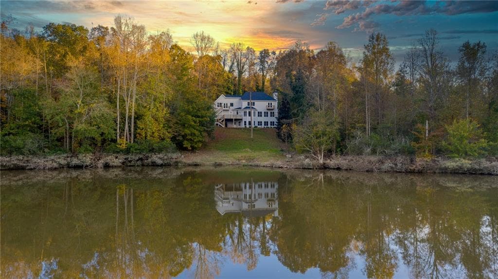 4 bedroom, 4 bathroom single family residence sold at 7335 Cox Road, Cumming, GA 30028