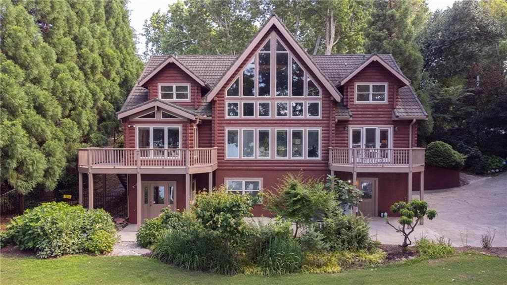4 bedroom, 5 bathroom, 4,786 sq ft single family residence sold at 6205 Lake Lanier Heights Road, Buford, GA 30518