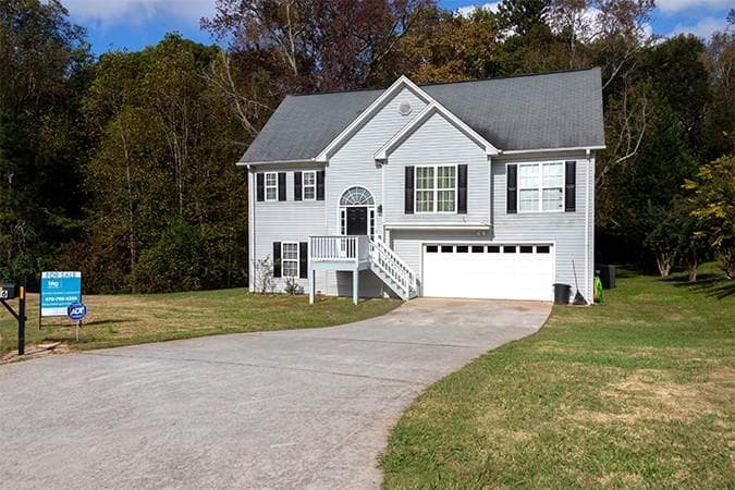 5 bedroom, 3 bathroom, 2,001 sq ft single family residence sold at 2936 Evergreen Hollow Drive, Gainesville, GA 30507