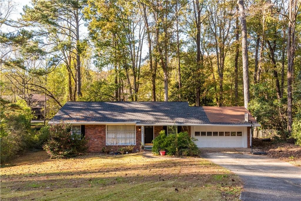 4 bedroom, 3 bathroom, 1,995 sq ft single family residence sold at 1842 Winchester Trail, Brookhaven, GA 30341