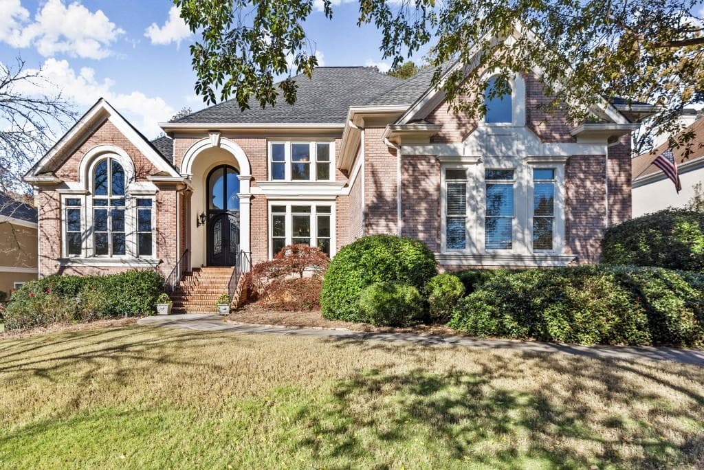 4 bedroom, 6 bathroom, 5,485 sq ft single family residence sold at 4000 Falls Ridge Drive, Alpharetta, GA 30022