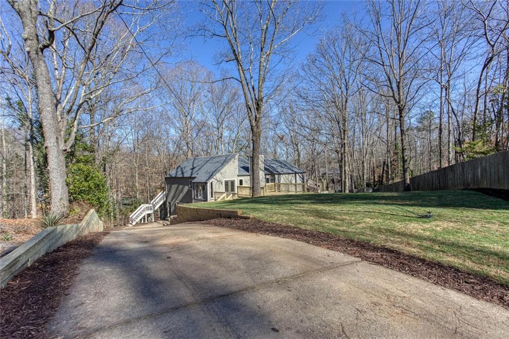 4 bedroom, 3 bathroom, 2,474 sq ft single family residence sold at 1241 Laurel Summit Drive, Smyrna, GA 30082