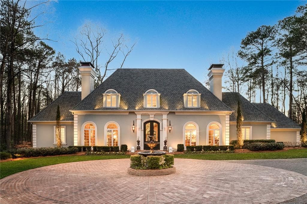7 bedroom, 8 bathroom, 8,444 sq ft single family residence sold at 5040 Northside Drive, Atlanta, GA 30327