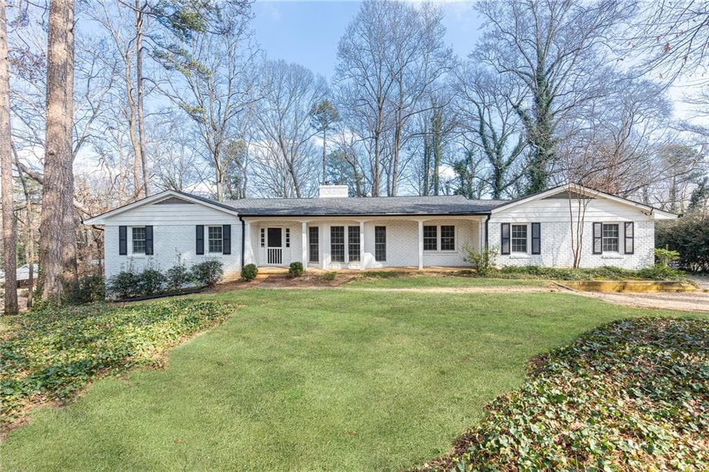 4 bedroom, 3 bathroom single family residence sold at 5305 Peachtree Dunwoody Road, Atlanta, GA 30342