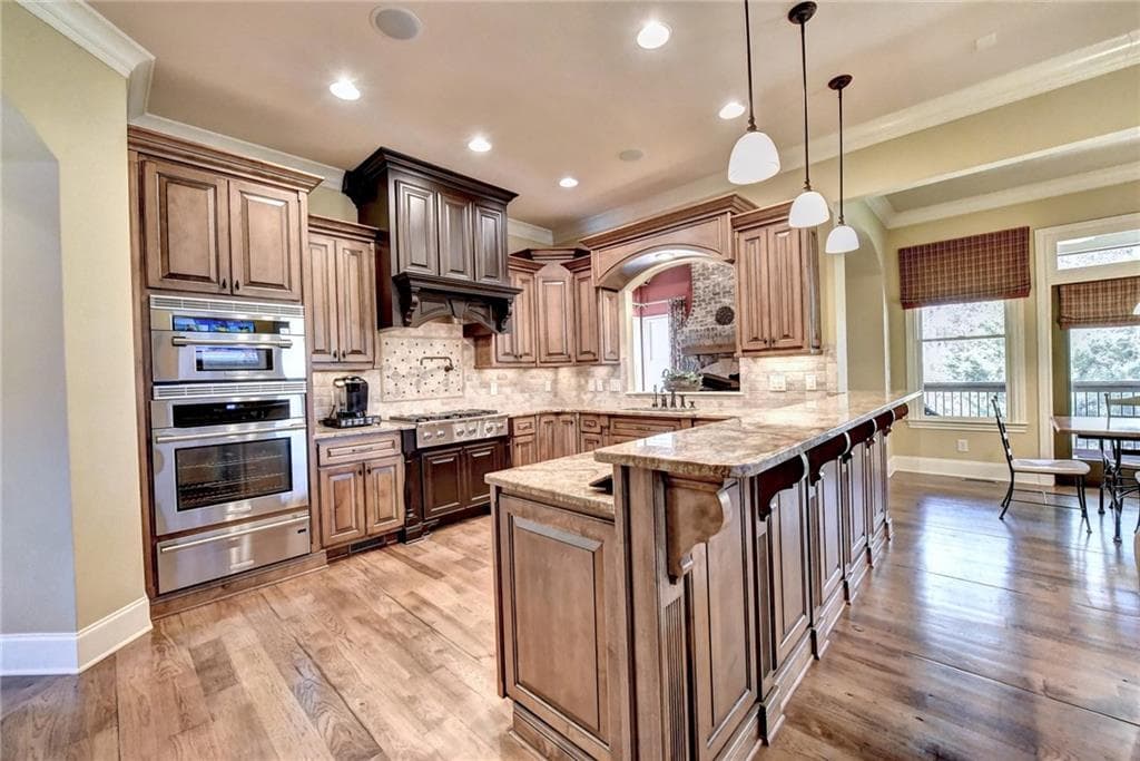 6 bedroom, 7 bathroom, 6,337 sq ft single family residence sold at 3090 Stonecrest Drive, Cumming, GA 30041