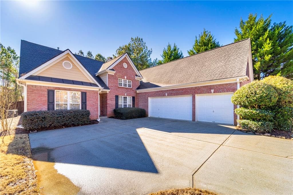 4 bedroom, 3 bathroom, 2,630 sq ft single family residence sold at 4003 Suwanee Place Drive, Suwanee, GA 30024