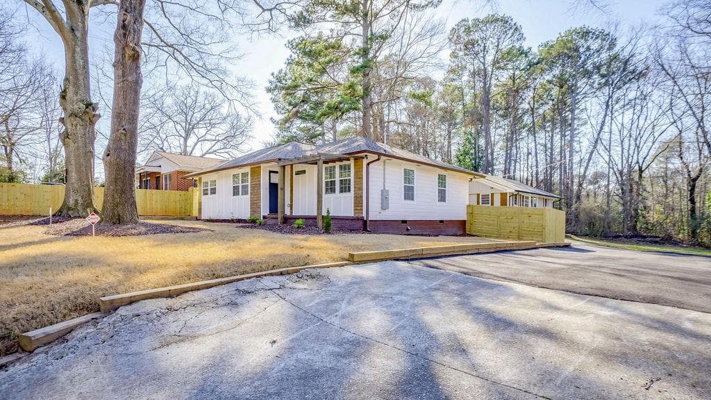 6 bedroom, 4 bathroom, 2,309 sq ft single family residence sold at 566 A&B Woods Drive, Atlanta, GA 30318