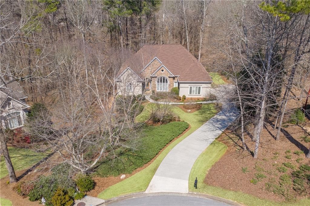 3 bedroom, 4 bathroom, 3,881 sq ft single family residence sold at 4405 Laurel Grove Trace, Suwanee, GA 30024