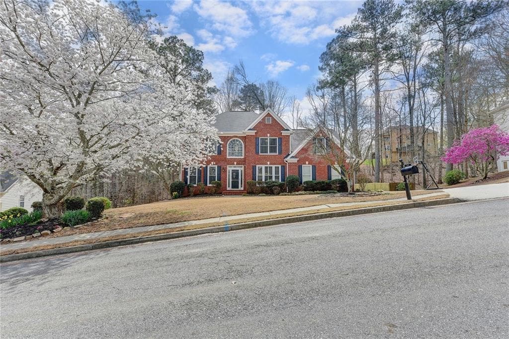 5 bedroom, 4 bathroom, 4,395 sq ft single family residence sold at 345 Ruby Forest Parkway, Suwanee, GA 30024
