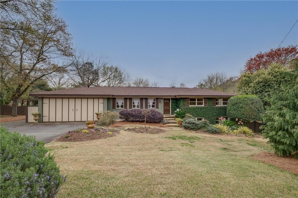 4 bedroom, 2 bathroom, 1,882 sq ft single family residence sold at 1796 Sandy Plains Road, Marietta, GA 30066