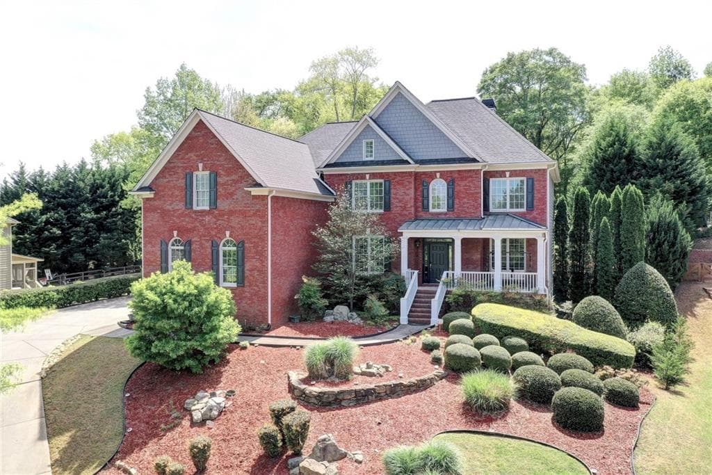 6 bedroom, 5 bathroom, 6,076 sq ft single family residence sold at 1050 Water View Lane, Suwanee, GA 30024