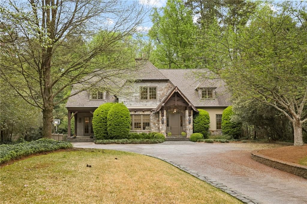 4 bedroom, 6 bathroom, 6,008 sq ft single family residence sold at 3282 Wood Valley Road, Atlanta, GA 30327