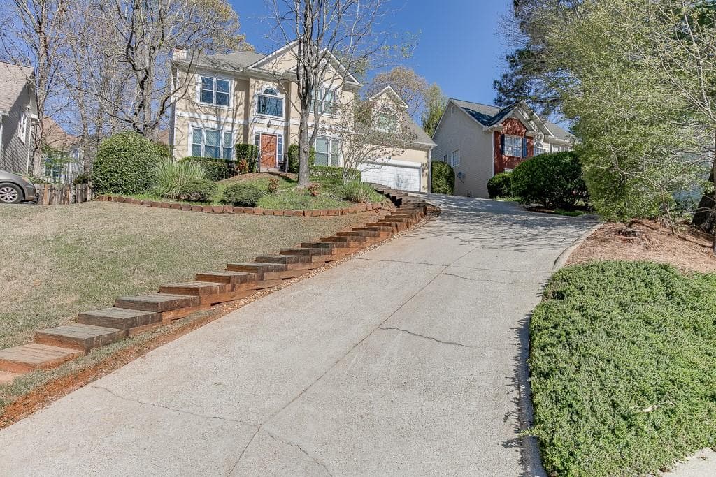 4 bedroom, 3 bathroom, 2,290 sq ft single family residence sold at 45 Grove Place, Suwanee, GA 30024