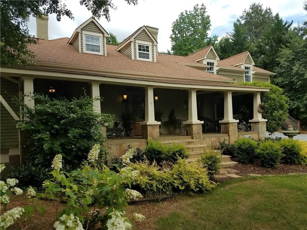 5 bedroom, 4 bathroom, 4,058 sq ft single family residence sold at 10465 Woodstock Road, Roswell, GA 30075