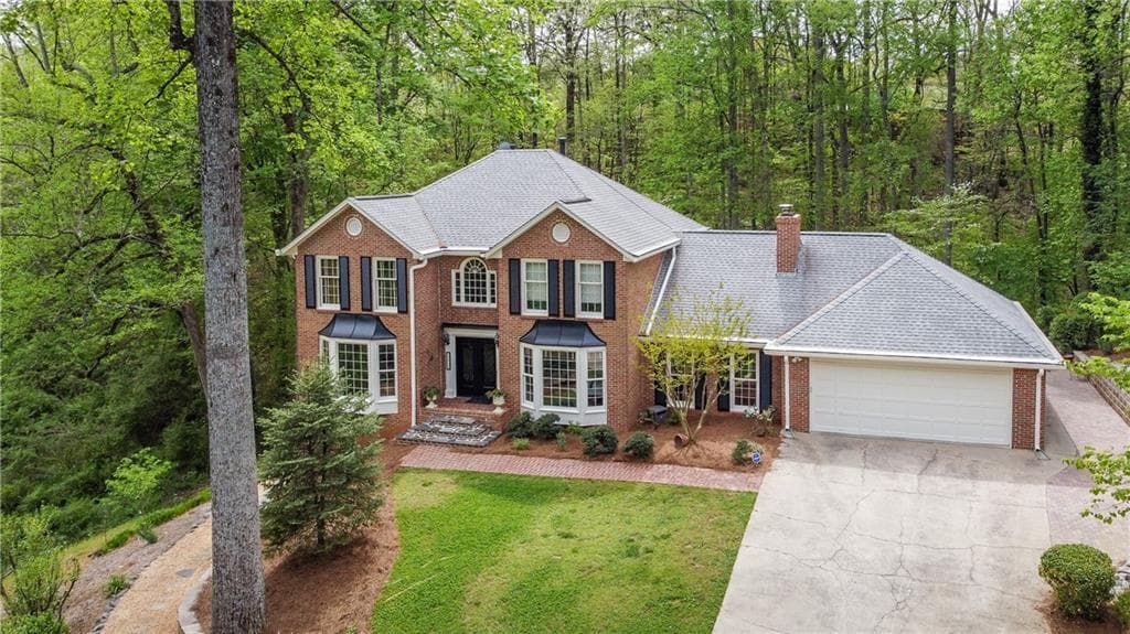5 bedroom, 5 bathroom, 4,900 sq ft single family residence sold at 11930 Mountain Laurel Drive, Roswell, GA 30075