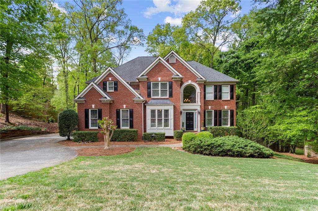 4 bedroom, 3 bathroom, 4,273 sq ft single family residence sold at 2095 Woods River Lane, Duluth, GA 30097