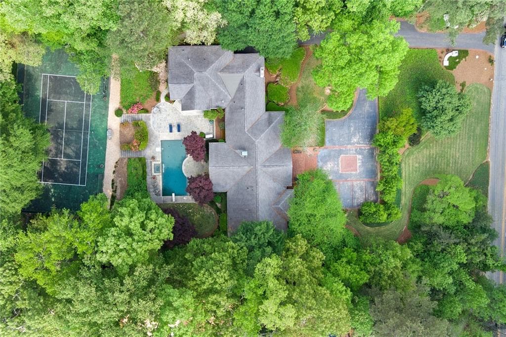 4 bedroom, 5 bathroom, 5,219 sq ft single family residence sold at 1035 W Wesley Road, Atlanta, GA 30327