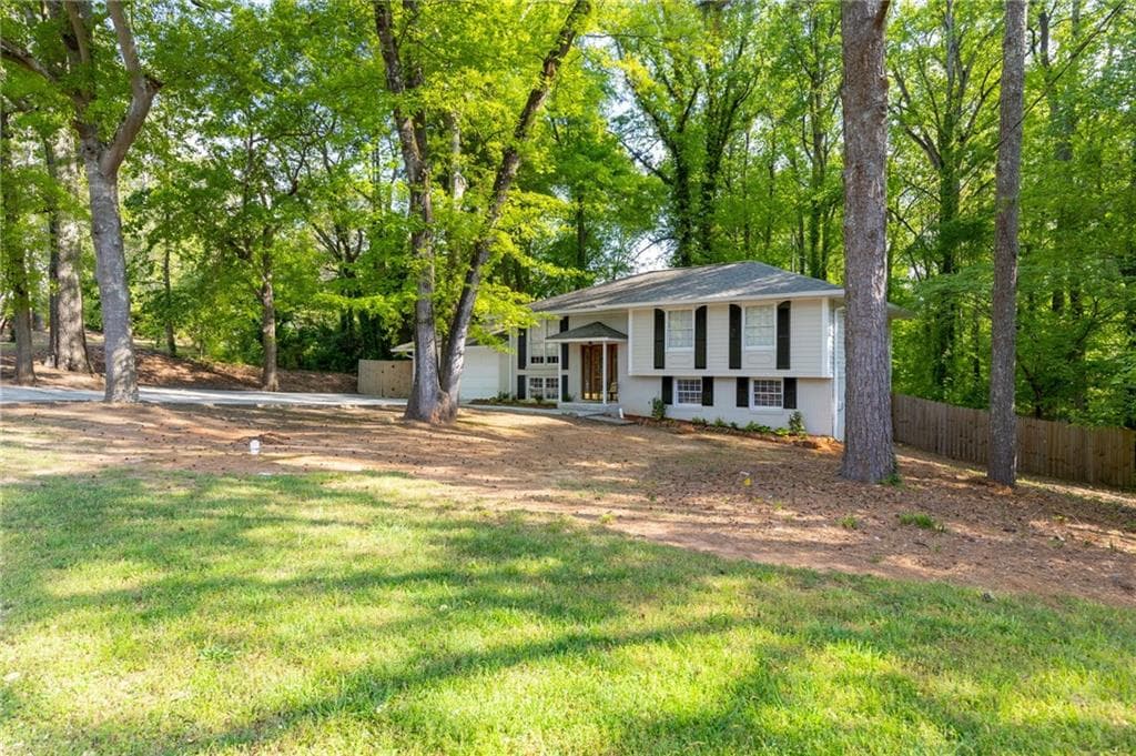 5 bedroom, 3 bathroom, 2,366 sq ft single family residence sold at 521 Woodgate Drive, Marietta, GA 30066