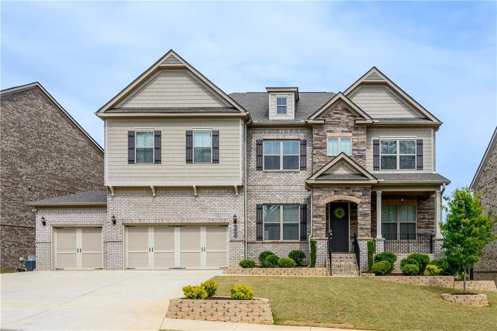 6 bedroom, 5 bathroom, 4,052 sq ft single family residence sold at 4651 Point Rock Drive, Buford, GA 30519