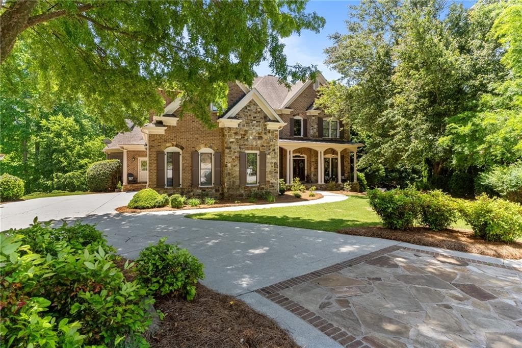 6 bedroom, 7 bathroom, 7,532 sq ft single family residence sold at 5318 Binghurst Court, Suwanee, GA 30024