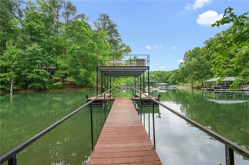 4 bedroom, 4 bathroom, 5,920 sq ft single family residence sold at 9320 Sutherlin Circle, Gainesville, GA 30506
