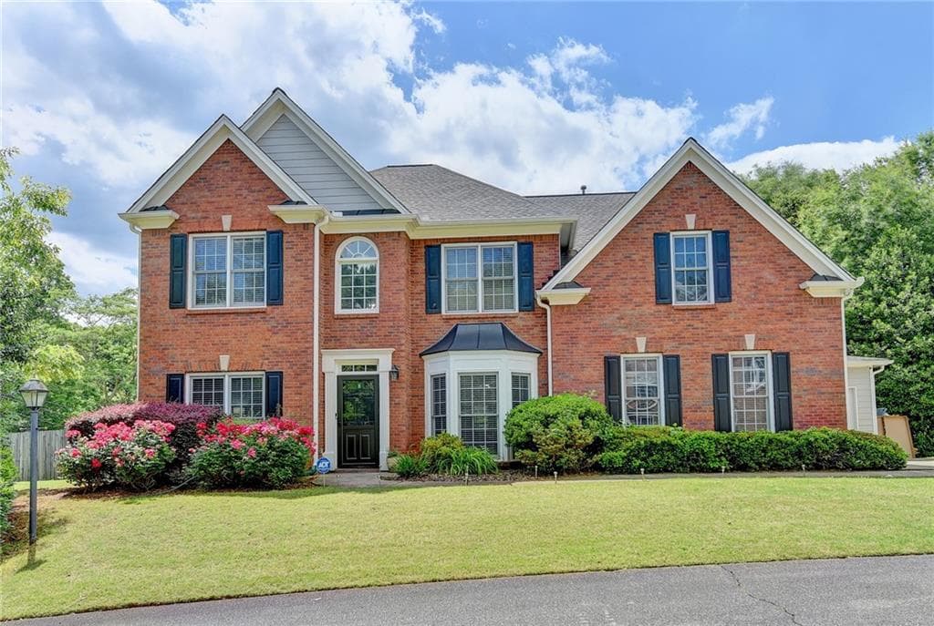 5 bedroom, 4 bathroom, 3,215 sq ft single family residence sold at 3850 Oak Lane, Marietta, GA 30062