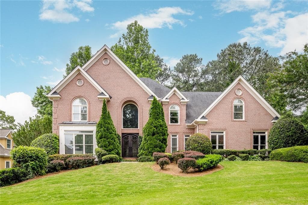 5 bedroom, 5 bathroom, 6,051 sq ft single family residence sold at 2462 Regency Lake Drive, Marietta, GA 30062