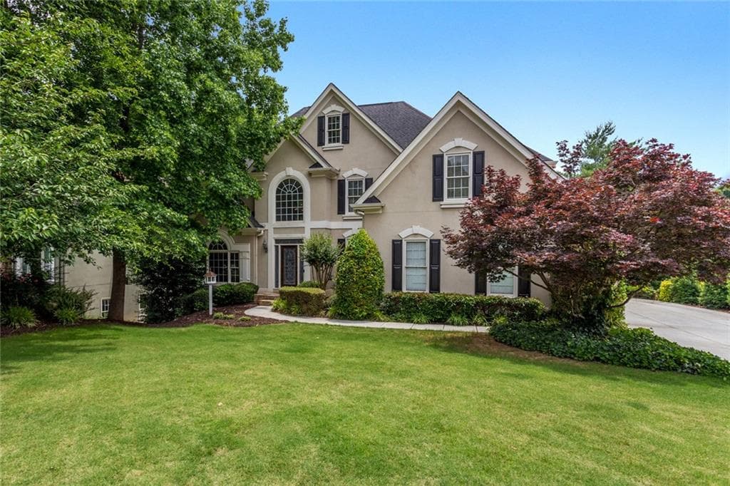 5 bedroom, 5 bathroom, 4,613 sq ft single family residence sold at 6205 Deerwoods Trail, Alpharetta, GA 30005