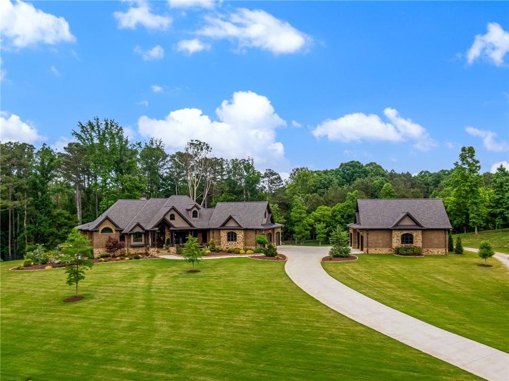 5 bedroom, 6 bathroom, 6,970 sq ft single family residence sold at 140 Soapstone Way, Canton, GA 30115