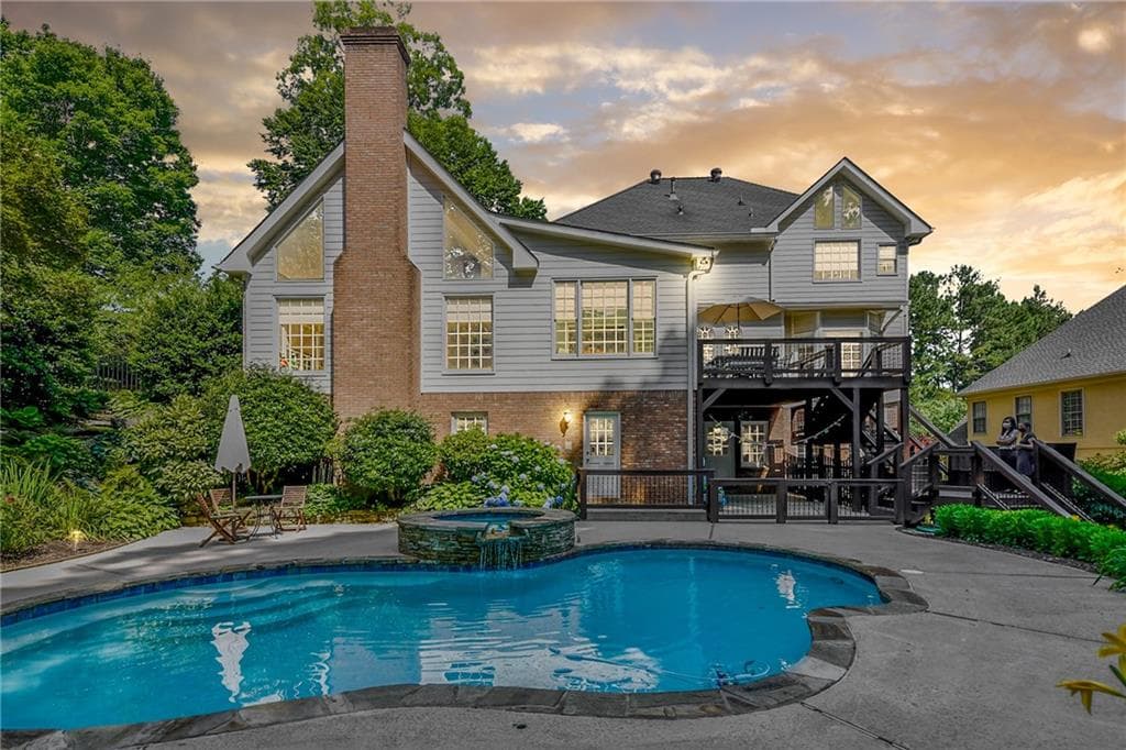 5 bedroom, 4 bathroom, 3,588 sq ft single family residence sold at 180 Chickering Lake Drive, Roswell, GA 30075