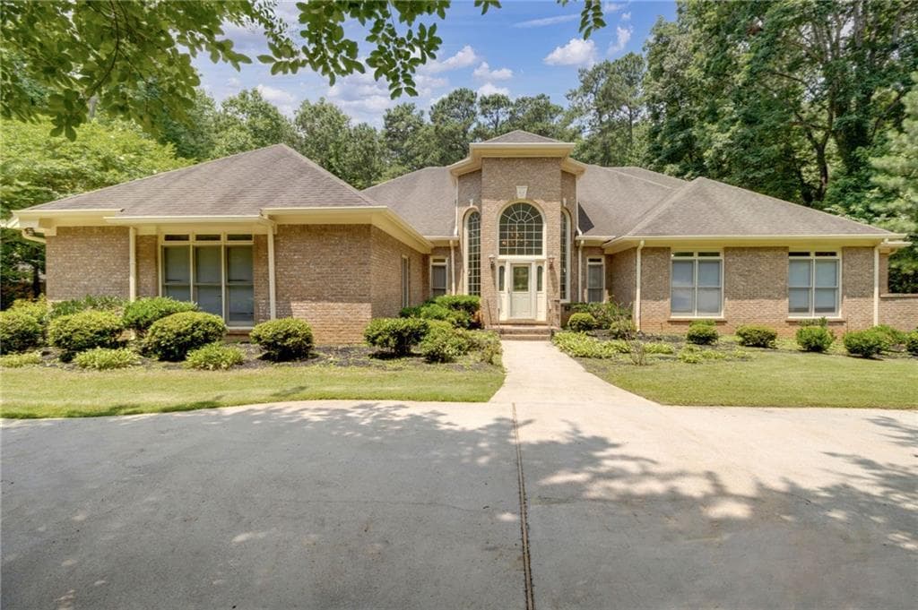 5 bedroom, 7 bathroom, 7,356 sq ft single family residence sold at 1988 Fairgreen Drive, Stone Mountain, GA 30087