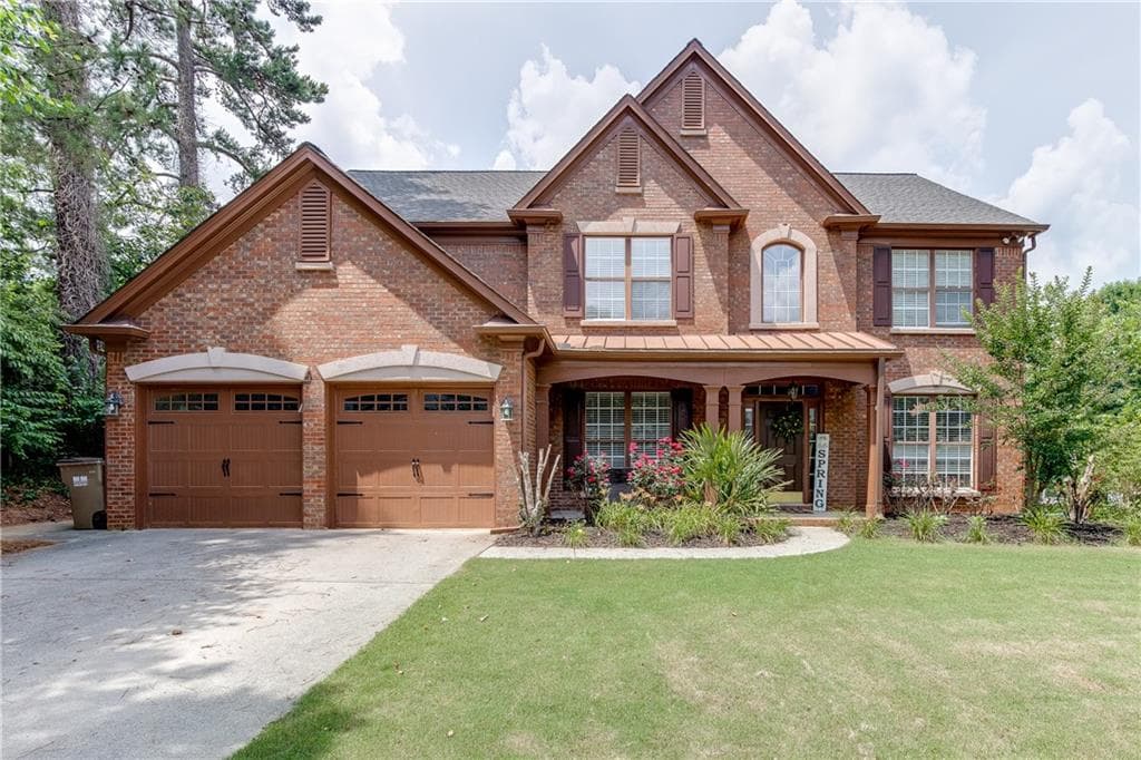 5 bedroom, 3 bathroom, 2,923 sq ft single family residence sold at 1410 Montcliff Drive, Cumming, GA 30041