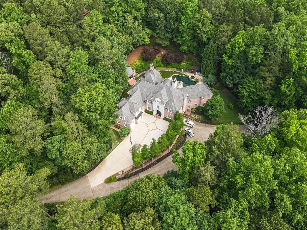 5 bedroom, 8 bathroom, 8,231 sq ft single family residence sold at 123 RUSSELL Road, Roswell, GA 30075