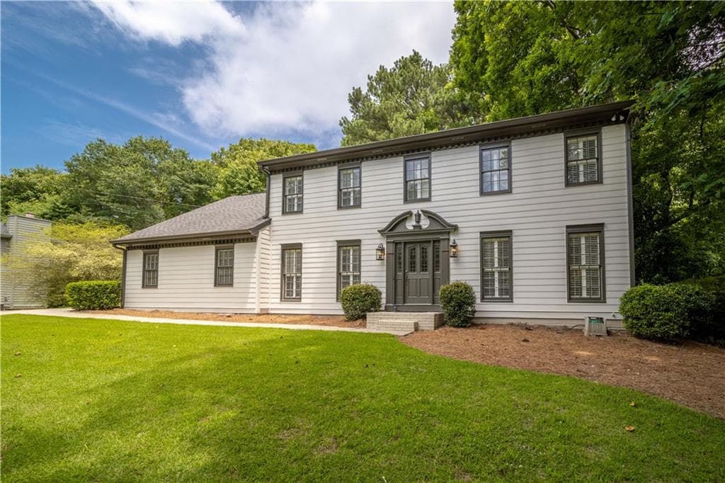 5 bedroom, 3 bathroom, 3,343 sq ft single family residence sold at 1630 Oakwood Drive, Roswell, GA 30075