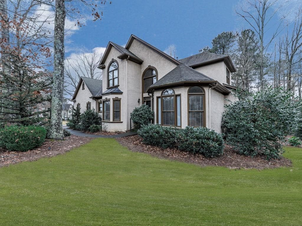 5 bedroom, 6 bathroom, 4,070 sq ft single family residence sold at 8000 E Ridge Lane, Woodstock, GA 30189